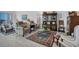 Comfortable living room with elegant furnishings, art, and sliding doors that lead to a balcony at 13313 Gasparilla Rd # C501 & Slip 11, Placida, FL 33946