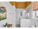 Bathroom featuring glass shower and pedestal sink with decorative artwork at 14 Palm Dr, Placida, FL 33946