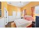 Cozy bedroom with a ceiling fan, and large windows that give plenty of light to the space at 14 Palm Dr, Placida, FL 33946