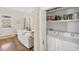 Open-concept living area and closet laundry area features modern appliances for convenient chores at 14 Palm Dr, Placida, FL 33946