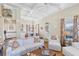 Cozy living room with coffered ceilings, coastal-patterned curtains, and a bright, airy feel at 14 Palm Dr, Placida, FL 33946