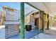 Coastal home features an outdoor shower near the stairs, perfect for rinsing off after a day at the beach at 14 Palm Dr, Placida, FL 33946
