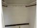 Empty closet features white walls, a top shelf, and a clothes rod for optimal storage solutions at 1417 Terry Ave, Punta Gorda, FL 33980