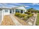 Backyard features low maintenance landscaping, patio, and easy access to the community at 14281 Palm Ter, Port Charlotte, FL 33953