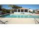 Sparkling community pool with lounge seating for relaxing afternoons in the sun at 14281 Palm Ter, Port Charlotte, FL 33953