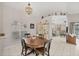 Cozy dining area with chandelier lighting and direct view into the adjacent living space at 14281 Palm Ter, Port Charlotte, FL 33953