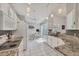 Modern kitchen featuring white cabinetry, granite countertops, and stainless steel appliances at 14281 Palm Ter, Port Charlotte, FL 33953