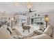 Bright and airy living room with tile floors, comfortable seating, and elegant decor at 14281 Palm Ter, Port Charlotte, FL 33953
