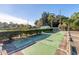 Outdoor shuffleboard courts offering a fun recreational activity surrounded by lovely landscaping at 14281 Palm Ter, Port Charlotte, FL 33953