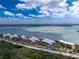 Waterfront condo complex with beach access, beautiful landscaping, and stunning views of the intercoastal waterway at 1651 Beach Rd # 311, Englewood, FL 34223