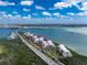 Scenic aerial view showcasing the community's proximity to the bay, offering tranquil waterfront living at 1651 Beach Rd # 311, Englewood, FL 34223