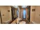 Bathroom featuring a vanity with a sink, toilet, and shower with glass door at 171 Caddy Rd, Rotonda West, FL 33947