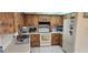 Efficient kitchen with ample counter space and practical appliances for easy meal preparation at 171 Caddy Rd, Rotonda West, FL 33947