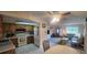 Well-lit kitchen offering a practical layout and seamless transition to the dining and living areas at 171 Caddy Rd, Rotonda West, FL 33947