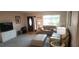 Comfortable living room featuring stylish furniture, natural light, and a welcoming ambiance at 171 Caddy Rd, Rotonda West, FL 33947