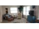 Relaxing seating area featuring natural light and stylish decor for a comfortable living space at 171 Caddy Rd, Rotonda West, FL 33947