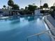 Community pool with plenty of room for lounging and enjoyment at 1977 Beach Rd # 87, Englewood, FL 34223