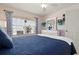Comfortable bedroom featuring a bright window and nice decor at 202 Silver Lake Dr # 203, Venice, FL 34292