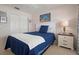 Relaxing bedroom with a full closet and a serene atmosphere at 202 Silver Lake Dr # 203, Venice, FL 34292