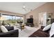 Bright living room with comfortable sofas and sliding doors to the balcony at 202 Silver Lake Dr # 203, Venice, FL 34292