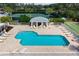 Beautifully maintained community pool with a gazebo, perfect for enjoying sunny days at 202 Silver Lake Dr # 203, Venice, FL 34292