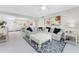 Inviting living room featuring tile floors, a plush sofa, stylish decor, and a bright, open layout at 2380 N Beach Rd # 108, Englewood, FL 34223