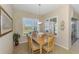 Cozy dining area with plenty of light and views to the outdoors at 2625 Wax Myrtle, Port Charlotte, FL 33953