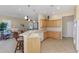Open kitchen with a breakfast bar overlooking the living room at 2625 Wax Myrtle, Port Charlotte, FL 33953