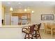 Bright kitchen featuring pendant lighting and bar seating at 2625 Wax Myrtle, Port Charlotte, FL 33953
