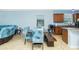 Dining area features a modern table with bench seating and kitchen access at 2628 Sherman Oak Dr, North Port, FL 34289