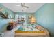 Inviting bedroom with calming decor and balcony access for a relaxing retreat at 2727 N Beach Rd # 113, Englewood, FL 34223