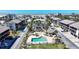A beautiful community featuring a pool, mature landscaping, and beach access at 2727 N Beach Rd # 113, Englewood, FL 34223