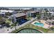 Lovely condo exterior features a pool, water access, and convenient covered parking at 2727 N Beach Rd # 113, Englewood, FL 34223