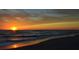 Beautiful sunset over the ocean, casting golden light on the beach at 2727 N Beach Rd # 113, Englewood, FL 34223
