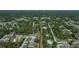 Aerial view showing home situated in quiet, wooded neighborhood at 3284 Newmark St, North Port, FL 34291