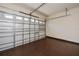 Spacious garage with painted floor and white paneled garage door at 3284 Newmark St, North Port, FL 34291