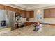 Beautiful kitchen with updated stainless steel appliances and granite countertops at 3574 Pennyroyal Rd, Port Charlotte, FL 33953