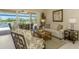Comfortable living room with stylish furnishings and sliding glass doors leading to the patio at 3574 Pennyroyal Rd, Port Charlotte, FL 33953