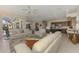 Open-concept living area seamlessly connects the living room and kitchen for easy entertaining at 3574 Pennyroyal Rd, Port Charlotte, FL 33953