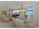 Inviting kitchen and living space with lovely views of water at 3574 Pennyroyal Rd, Port Charlotte, FL 33953