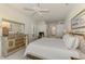 Comfortable main bedroom with a full bed, dresser, and closet at 3574 Pennyroyal Rd, Port Charlotte, FL 33953