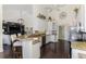 Well-equipped kitchen seamlessly connects to the living area, perfect for casual dining and socializing at 3615 Pennyroyal Rd, Port Charlotte, FL 33953