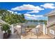 Balcony featuring a sitting area and views of the water at 38 Seawatch Lake Dr, Boca Grande, FL 33921
