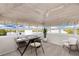 Bright home office space with lake view and modern furnishings for an ideal workspace at 38 Seawatch Lake Dr, Boca Grande, FL 33921