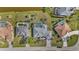 Aerial view of the house with a private pool and lush landscaping at 4 Sportsman Ln, Rotonda West, FL 33947