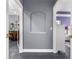 Hallway view to a bedroom and living area with decorative niche at 4 Sportsman Ln, Rotonda West, FL 33947