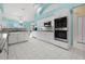 Bright kitchen with white cabinets, stainless steel appliances, and granite countertops at 4 Sportsman Ln, Rotonda West, FL 33947
