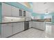 Kitchen featuring white cabinets, stainless steel appliances, granite countertops, and tile backsplash at 4 Sportsman Ln, Rotonda West, FL 33947