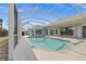 Expansive screened-in pool area with ample deck space, perfect for outdoor entertaining at 4 Sportsman Ln, Rotonda West, FL 33947