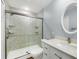 Bathroom featuring a sleek glass enclosed shower, vanity, and modern fixtures at 4260 Placida Rd # 8D, Englewood, FL 34224